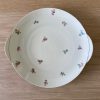 Ancien plat de présentation Jaeger à décor de fleurs et liseré or